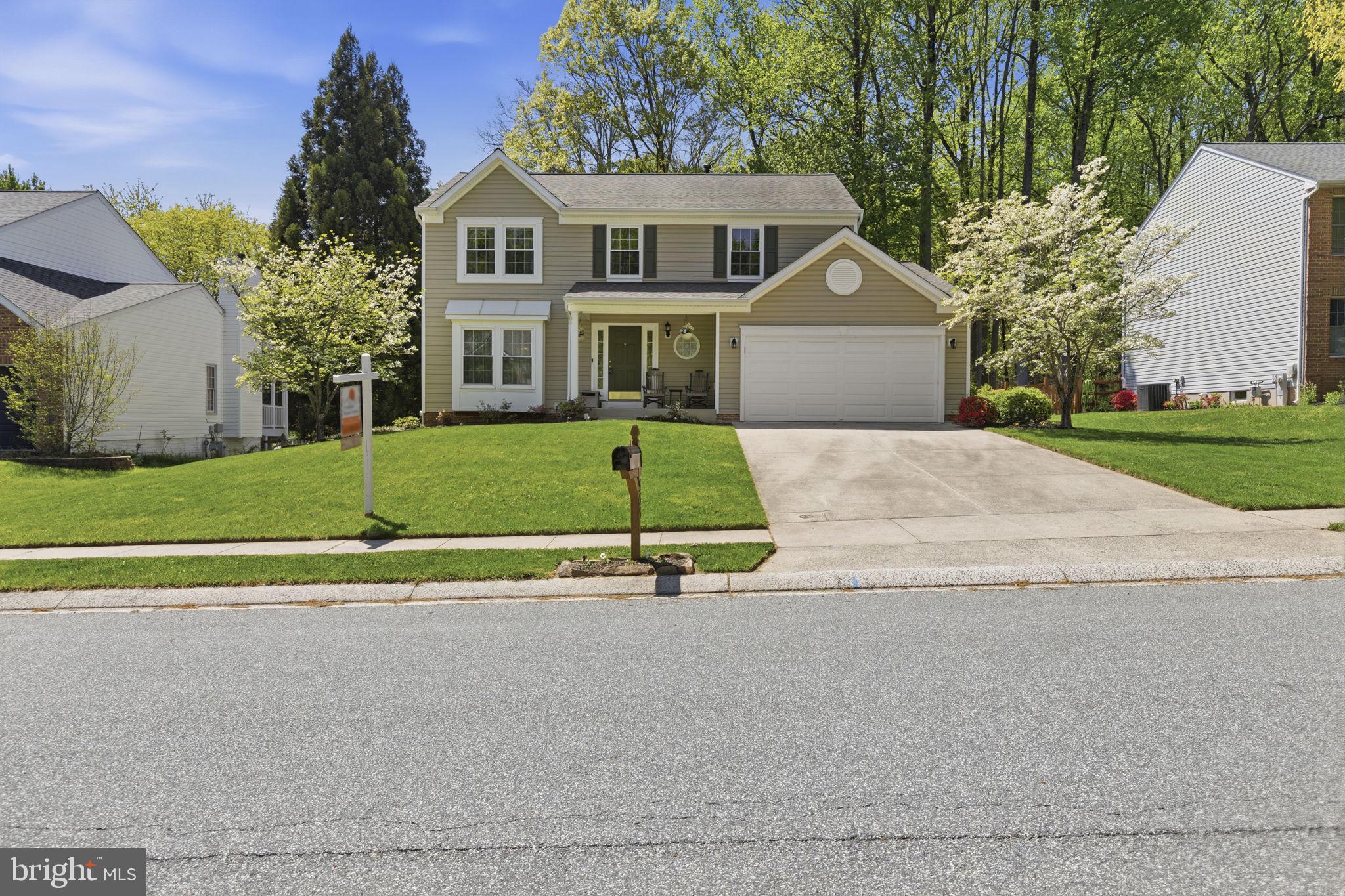 533 Inglewood Road Bel Air, MD 21015 - Photo 3 of 52 a white house with a yard and a large parking space