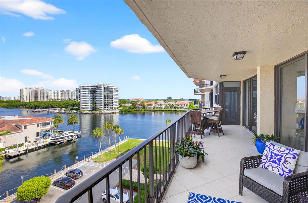 899 Jeffery Street, Unit 710 Boca Raton, FL 33487 - Photo 24 of 44 a balcony with outdoor seating and city view