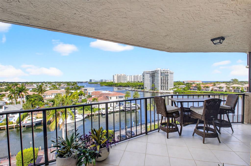 899 Jeffery Street, Unit 710 Boca Raton, FL 33487 - Photo 25 of 44 a view of a chairs and table in the balcony