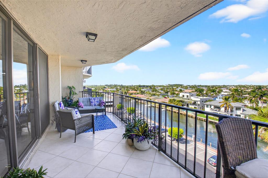 899 Jeffery Street, Unit 710 Boca Raton, FL 33487 - Photo 28 of 44 a view of a balcony with chairs