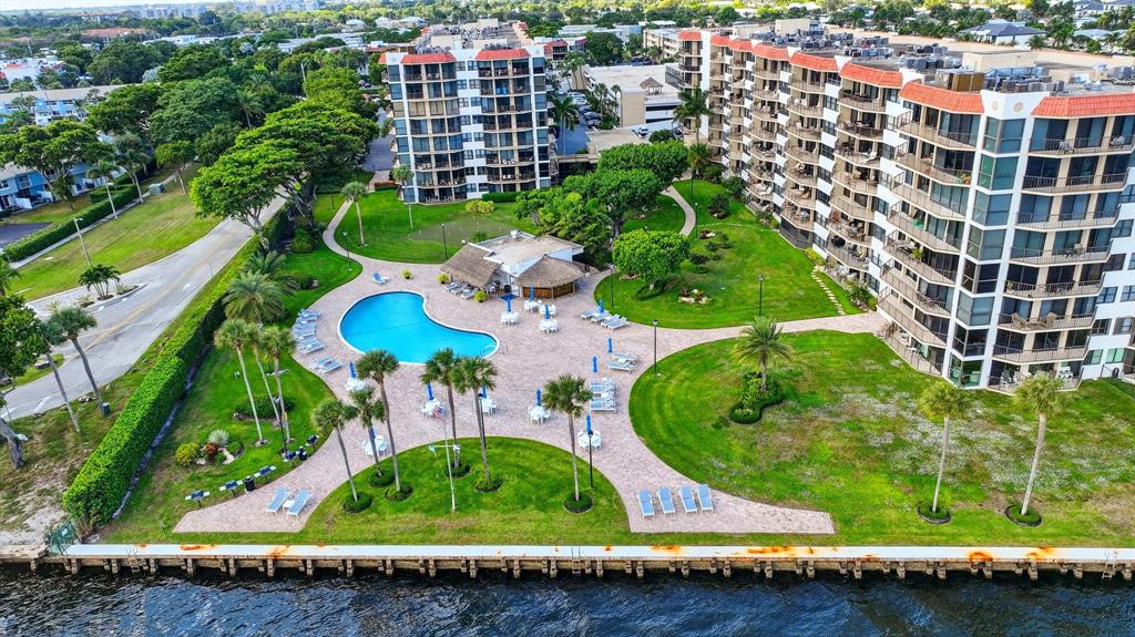 899 Jeffery Street, Unit 710 Boca Raton, FL 33487 - Photo 32 of 44 an aerial view of a residential houses with yard and green space