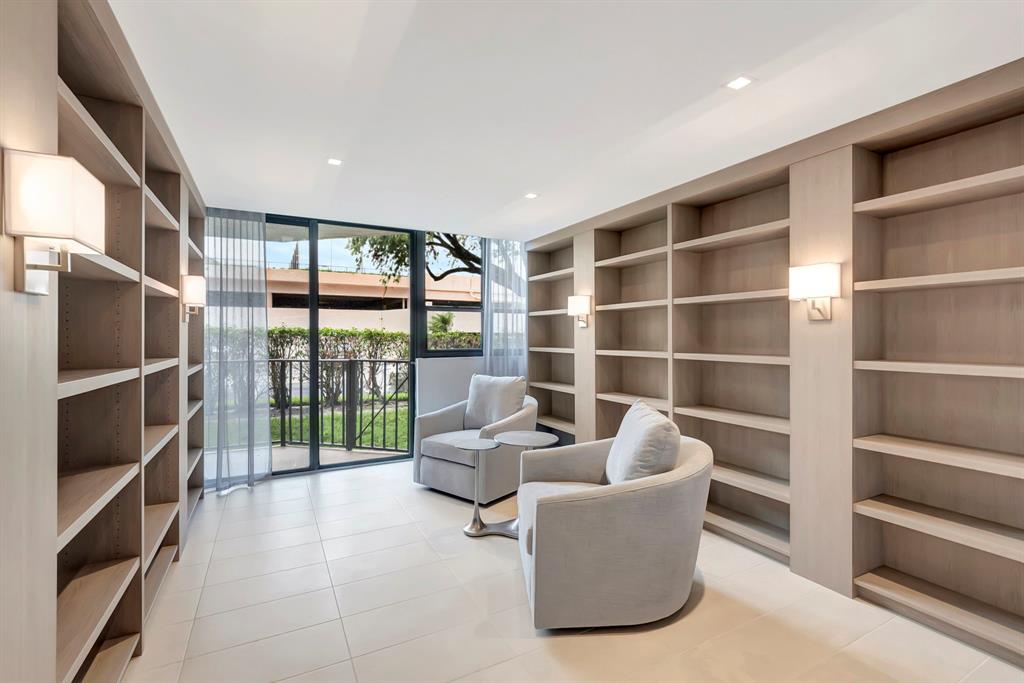 899 Jeffery Street, Unit 710 Boca Raton, FL 33487 - Photo 36 of 44 a living room with furniture cabinets and window