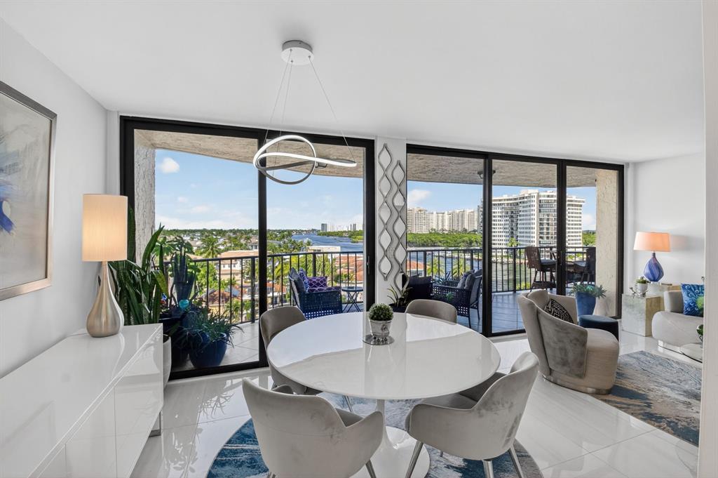 899 Jeffery Street, Unit 710 Boca Raton, FL 33487 - Photo 10 of 44 a living room with furniture and a potted plant