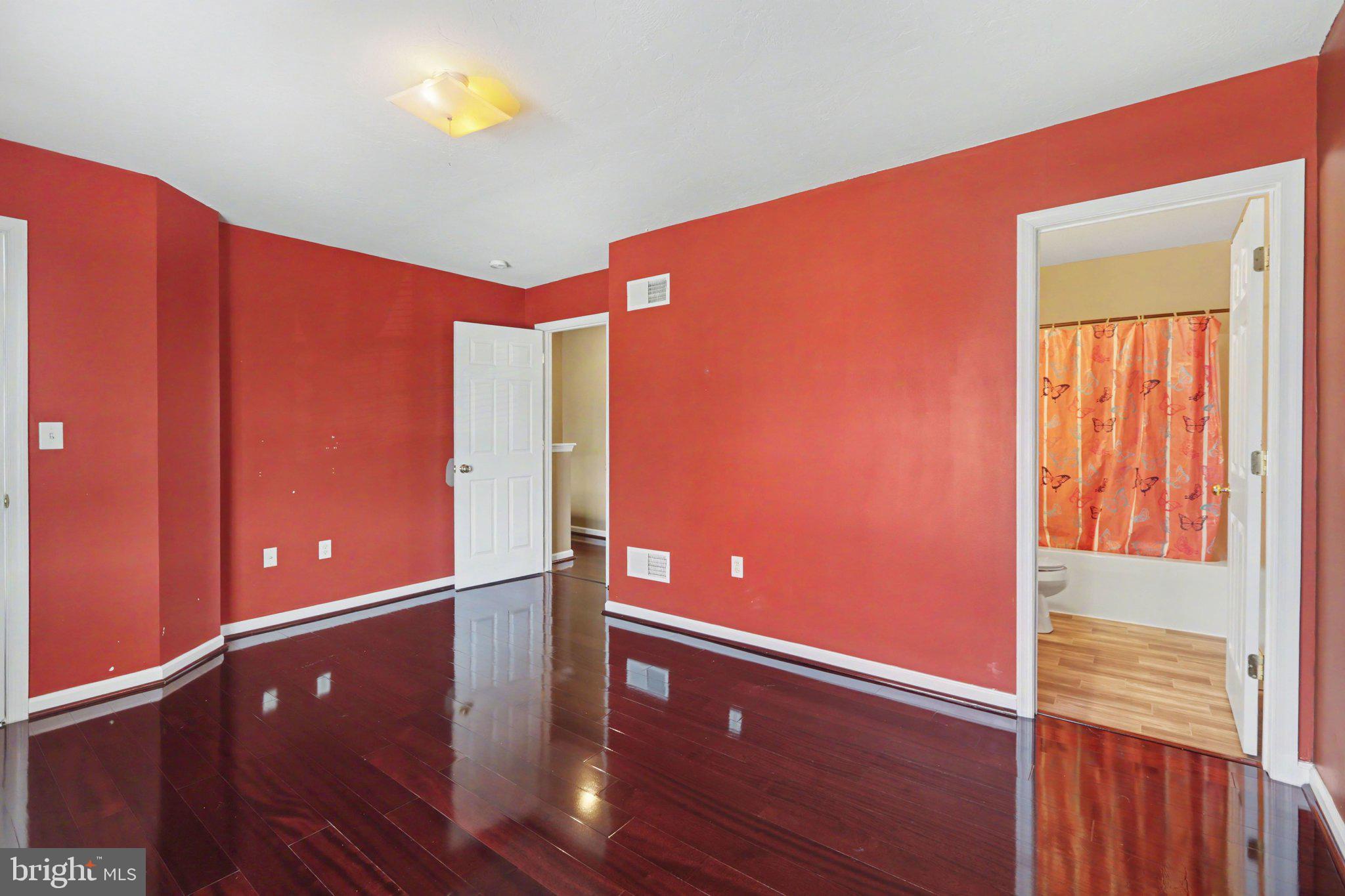 335 Cape Climb York, PA 17408 - Photo 14 of 34 Vibrant red walls enhance spacious charm.