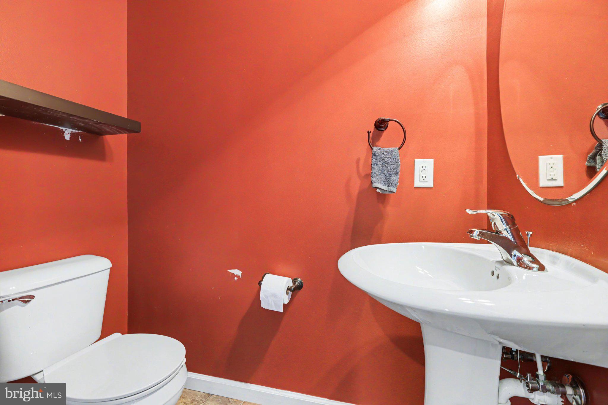 335 Cape Climb York, PA 17408 - Photo 15 of 34 Vibrant orange bathroom oasis.