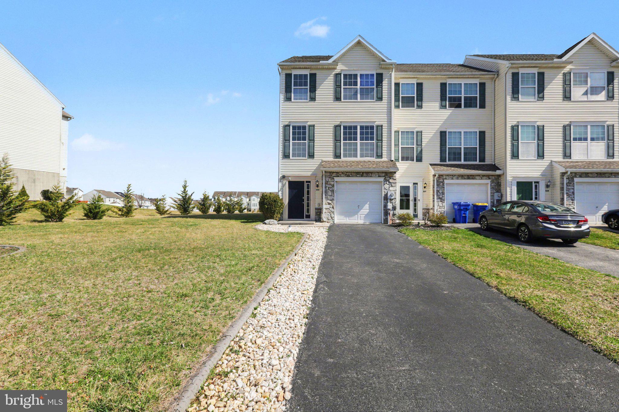 335 Cape Climb York, PA 17408 - Photo 2 of 34 Charming end-unit townhome exterior.