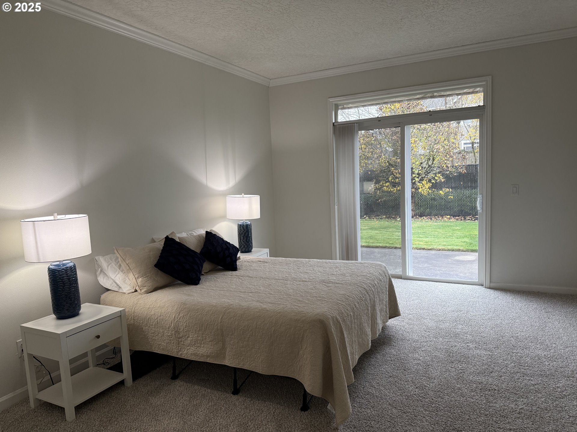 3956 Southeast 30th Street Gresham, OR 97080 - Photo 24 of 48 a bedroom with a bed a lamp and a window