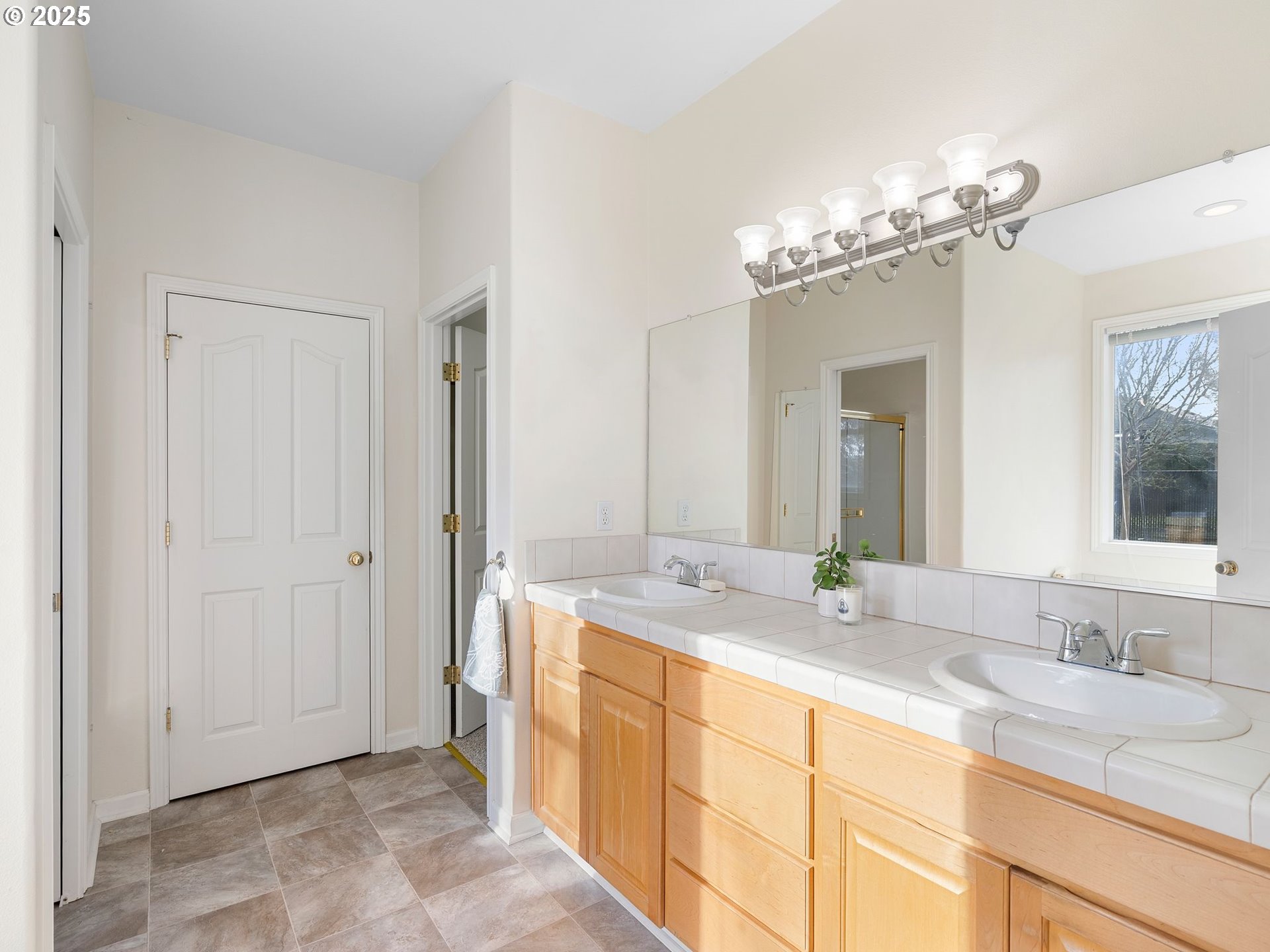 3956 Southeast 30th Street Gresham, OR 97080 - Photo 27 of 48 a bathroom with a granite countertop sink and a mirror
