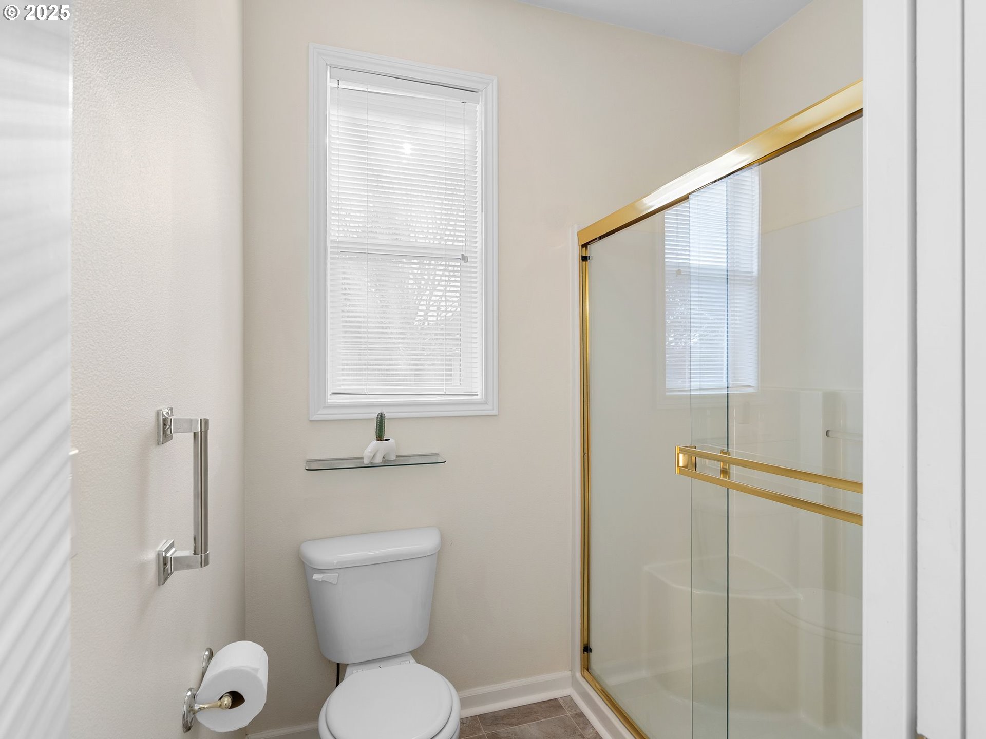 3956 Southeast 30th Street Gresham, OR 97080 - Photo 30 of 48 a bathroom with a granite countertop toilet a sink and a mirror