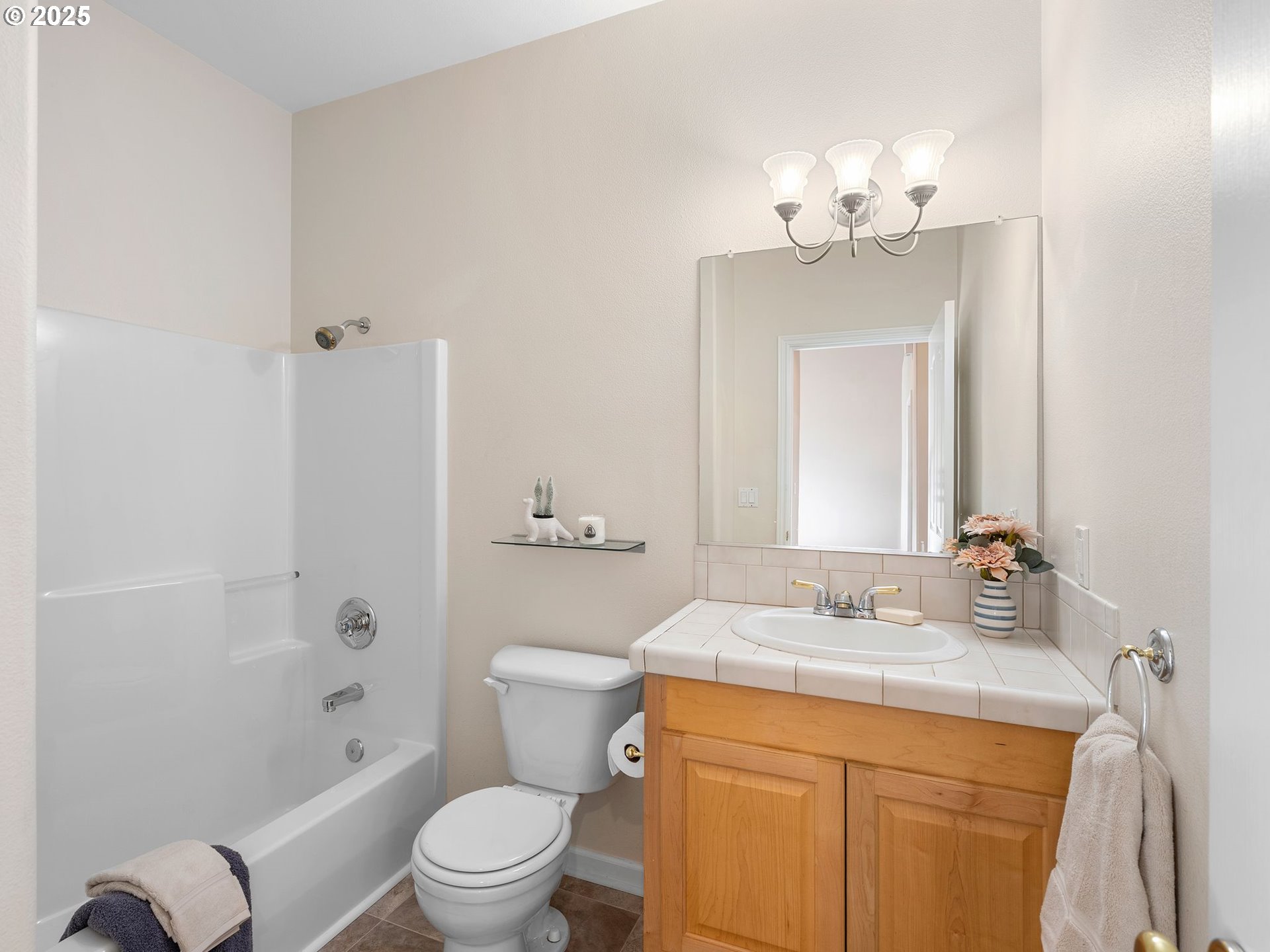 3956 Southeast 30th Street Gresham, OR 97080 - Photo 31 of 48 a bathroom with a double vanity sink toilet and shower