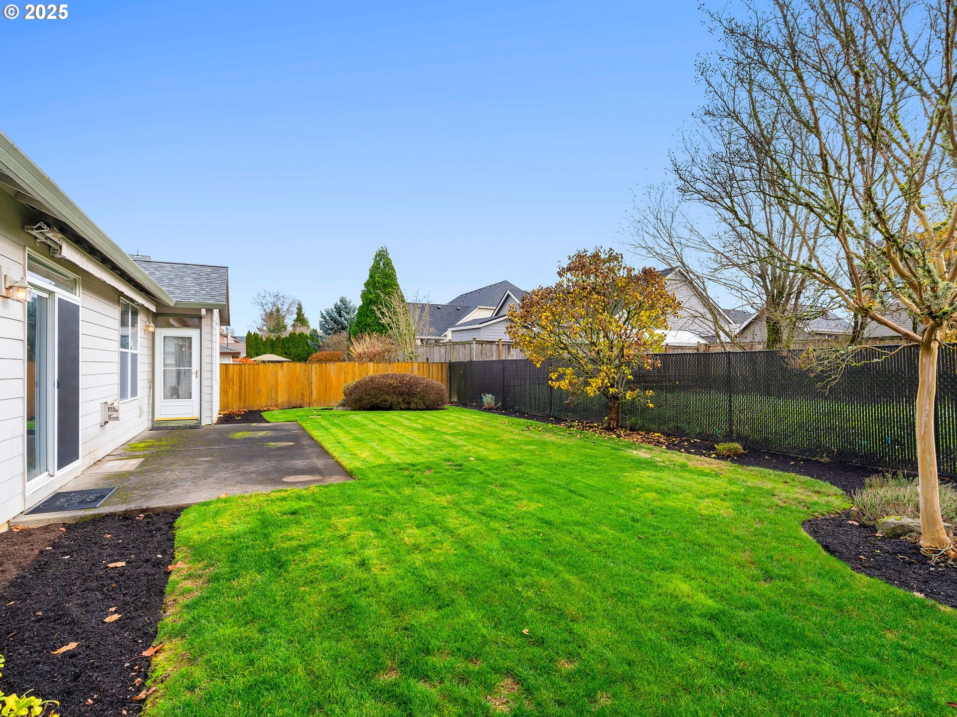 3956 Southeast 30th Street Gresham, OR 97080 - Photo 36 of 48 a backyard of a house with lots of green space