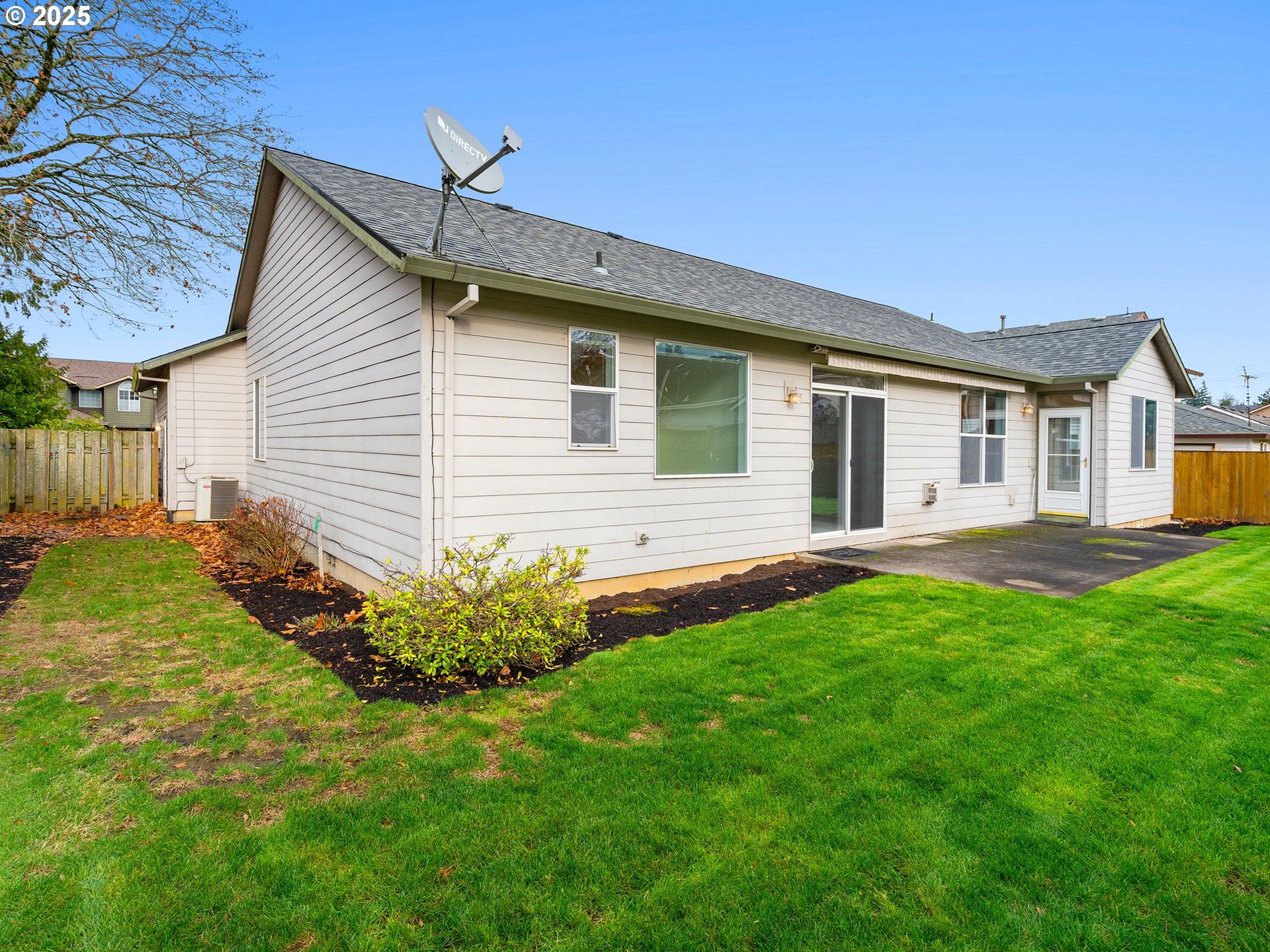 3956 Southeast 30th Street Gresham, OR 97080 - Photo 37 of 48 a front view of a house with a garden