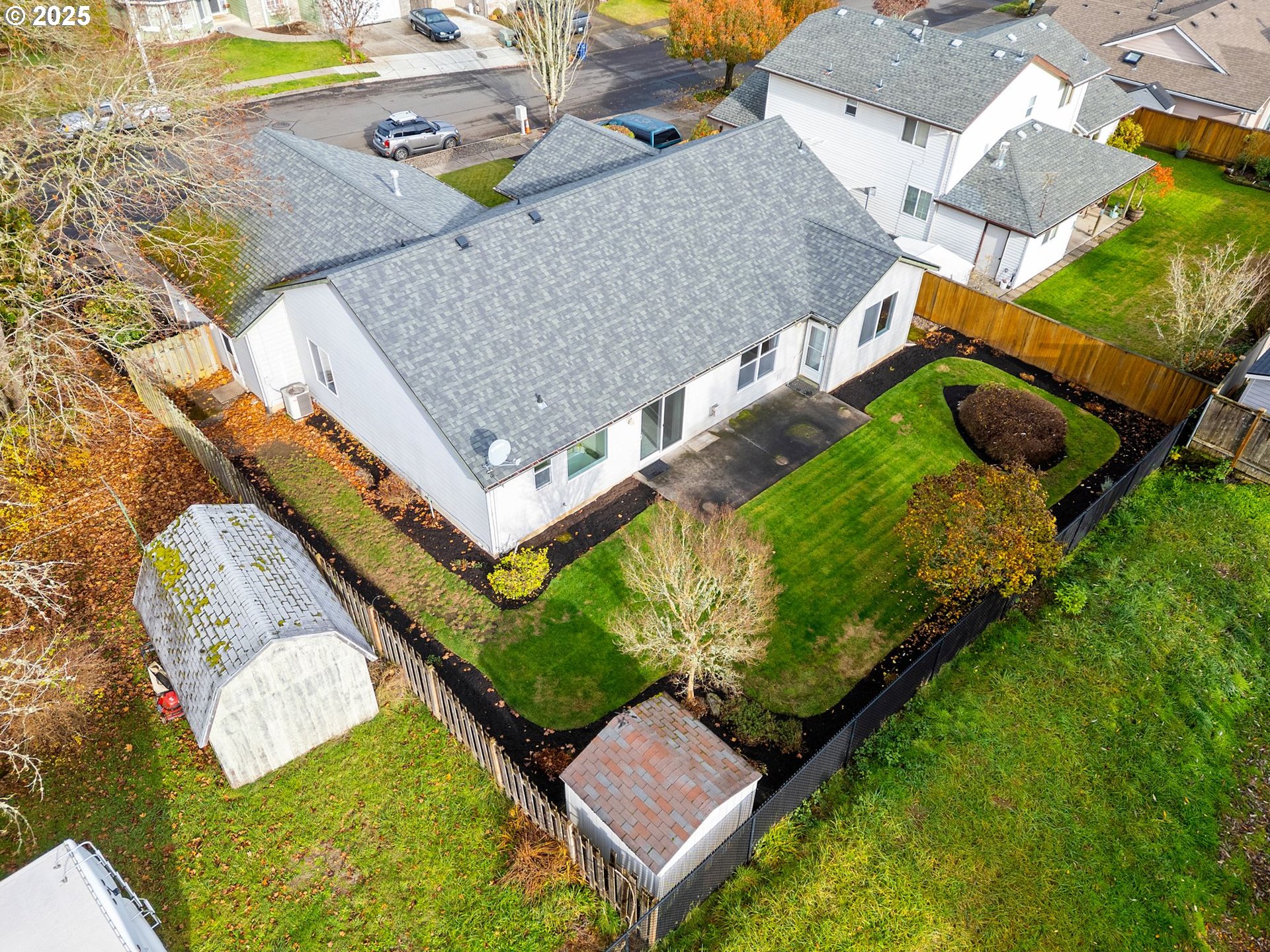 3956 Southeast 30th Street Gresham, OR 97080 - Photo 45 of 48 an aerial view of a house with a garden and swimming pool