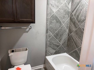 861 Stockdale Road Copperas Cove, TX 76522 - Photo 22 of 35 a bathroom with a sink and toilet