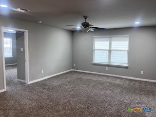861 Stockdale Road Copperas Cove, TX 76522 - Photo 27 of 35 an empty room with a window and a fan