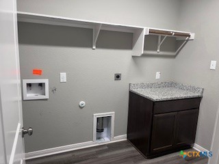 861 Stockdale Road Copperas Cove, TX 76522 - Photo 29 of 35 a bathroom with a granite countertop sink and a mirror