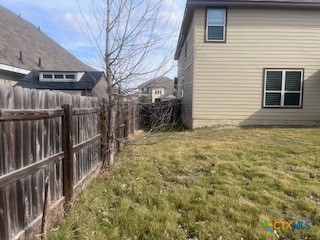 861 Stockdale Road Copperas Cove, TX 76522 - Photo 32 of 35 a view of a house with a large window and wooden fence