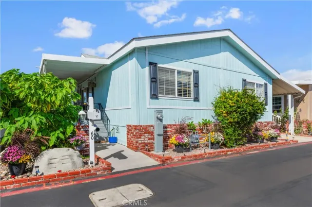 a front view of a house with street