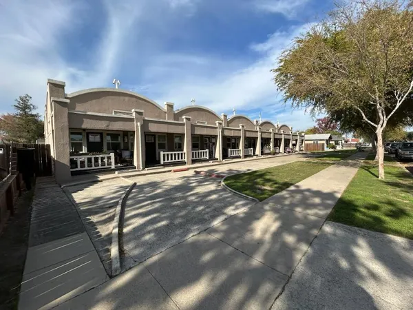 a view of a building with a garden