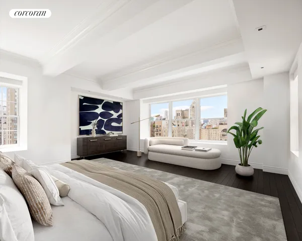 a bedroom with bed and a couch