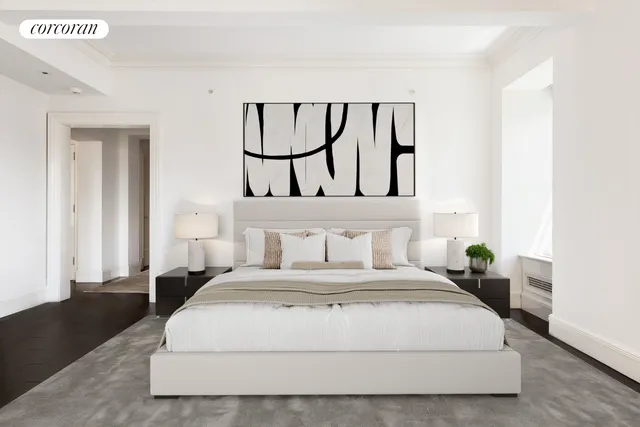 a bedroom with a large bed and a potted plant