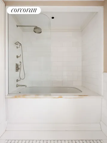 a bathroom with a bathtub