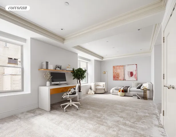 a workspace with furniture and window