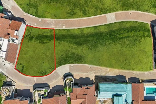 an aerial view of a house having swimming pool