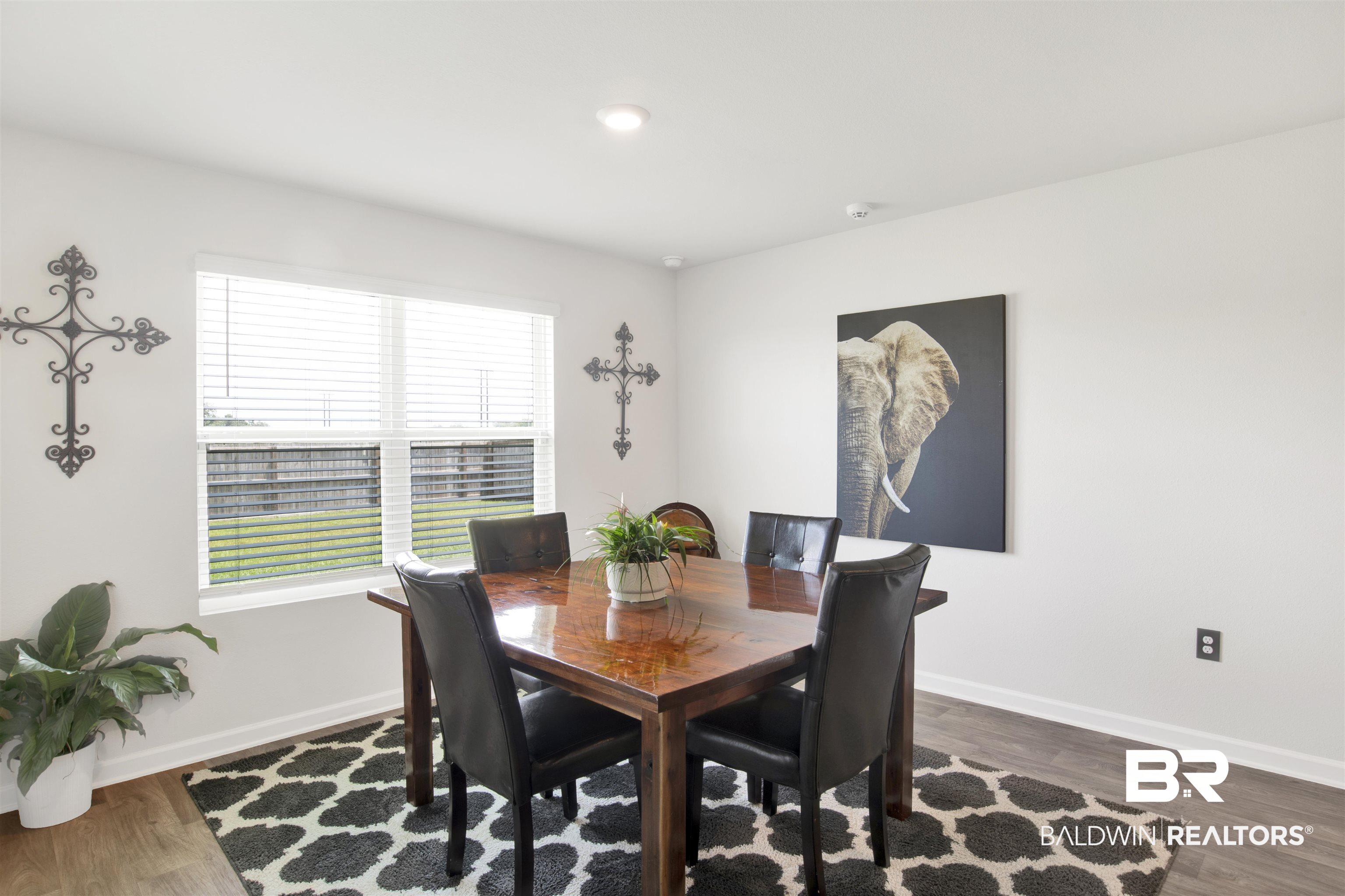 14731 Forsythia Loop Silverhill, AL 36576 - Photo 16 of 25 Dining room with hardwood / wood-style flooring