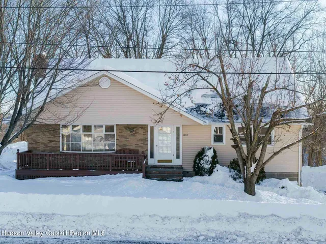 a house with trees in front of it