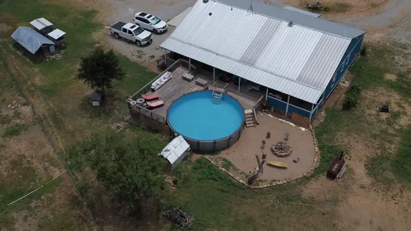 an aerial view of a house roof deck