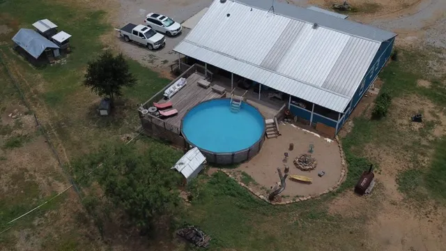an aerial view of a house roof deck