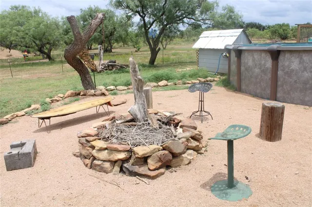 a balcony with wooden floor and city view