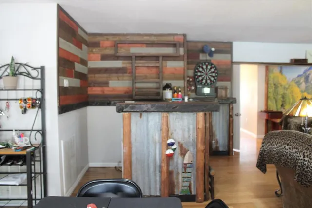 a view of living room with furniture and a window