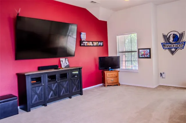 a view of a kitchen with wooden floor
