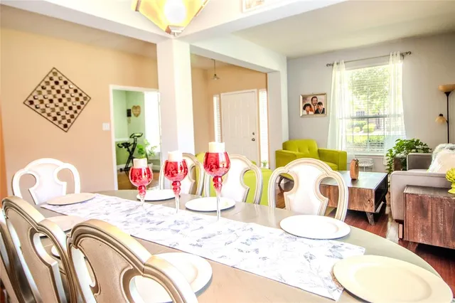 a bedroom with bed and a table