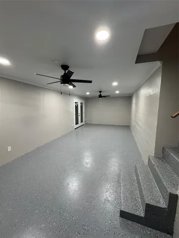 a view of a livingroom with a staircase