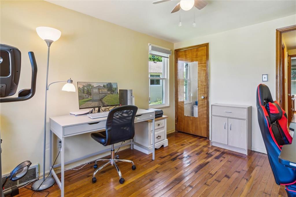 1616 Glenbrook Avenue Coraopolis, PA 15108 - Photo 17 of 31 a view of a workspace with furniture and a window