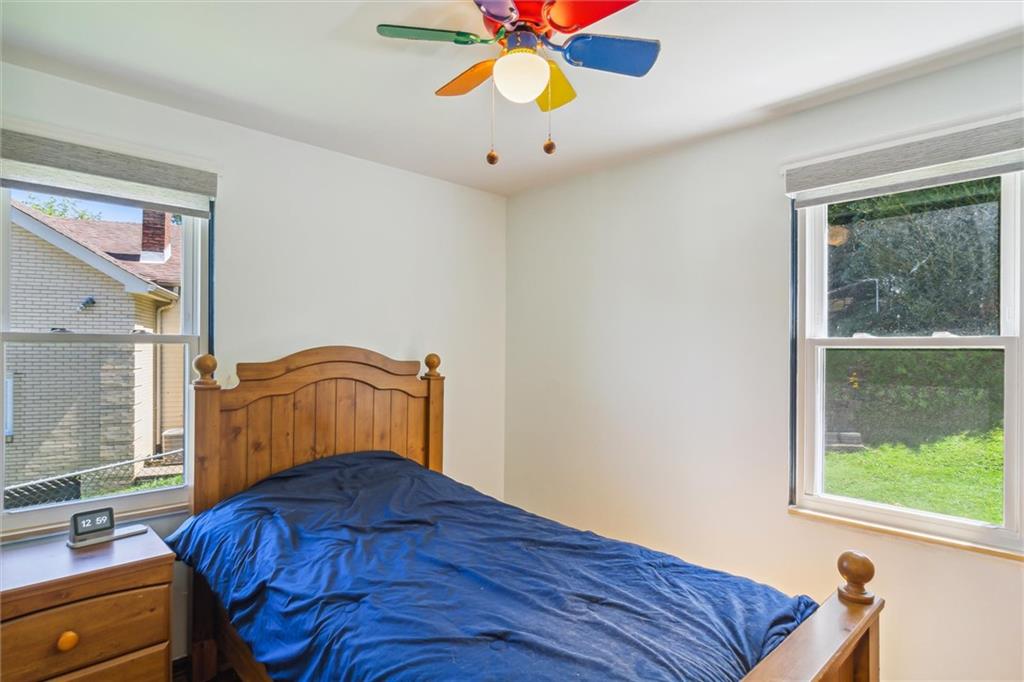 1616 Glenbrook Avenue Coraopolis, PA 15108 - Photo 21 of 31 a bedroom with a bed and a window
