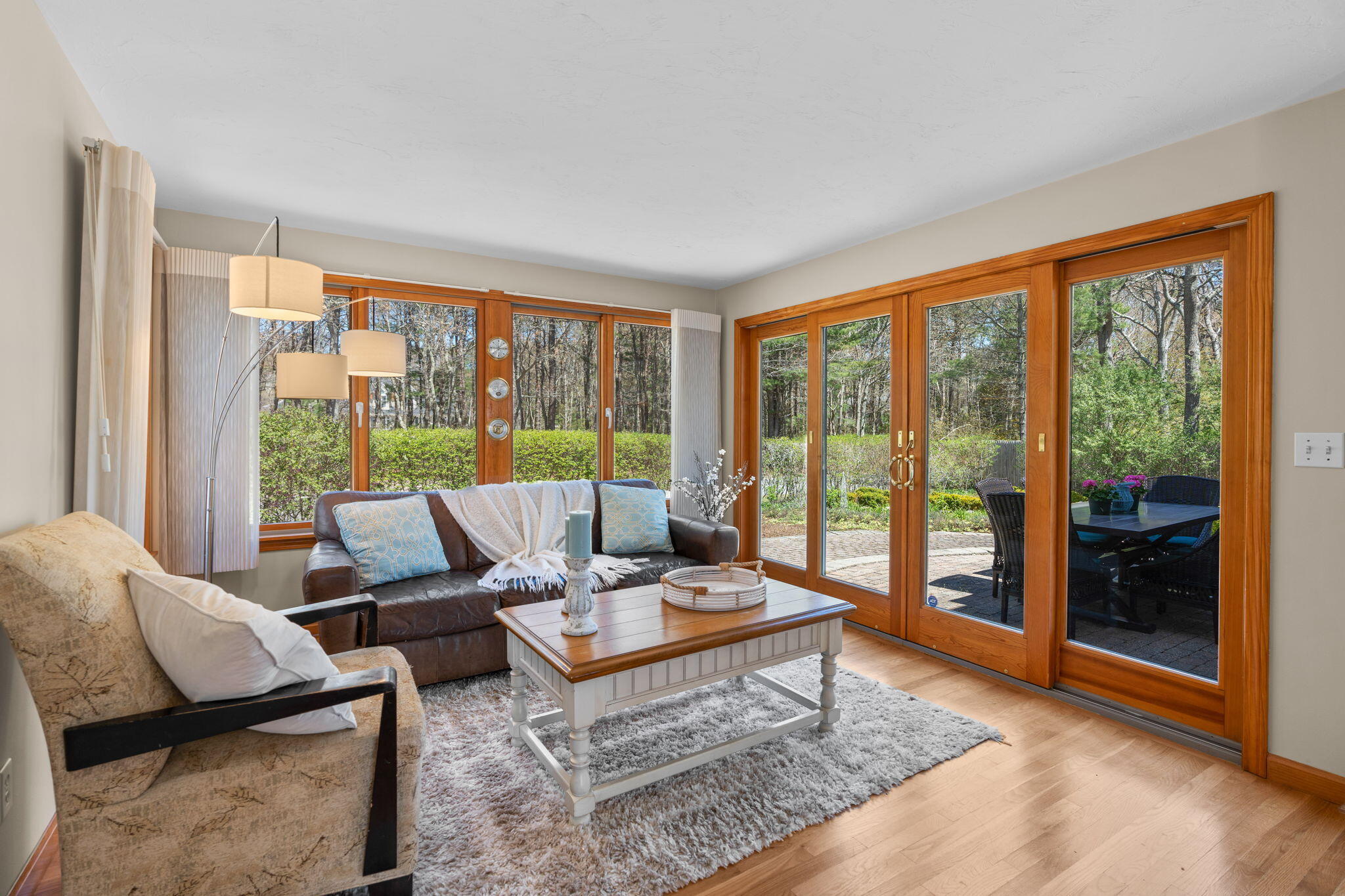 43 Neshobe Road Mashpee, MA 02649 - Photo 18 of 48 a living room with furniture and a large window