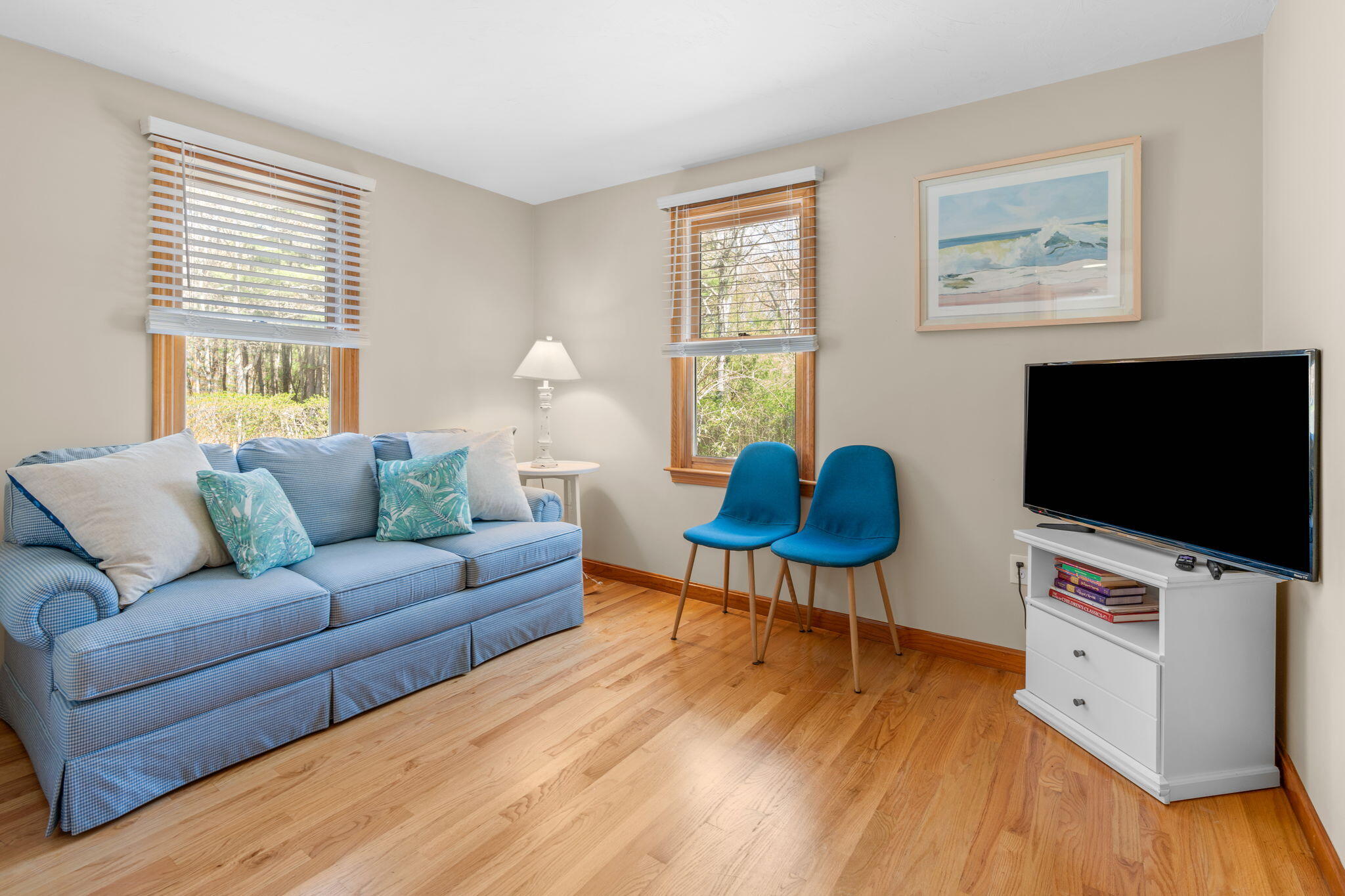 43 Neshobe Road Mashpee, MA 02649 - Photo 20 of 48 a living room with furniture and a flat screen tv