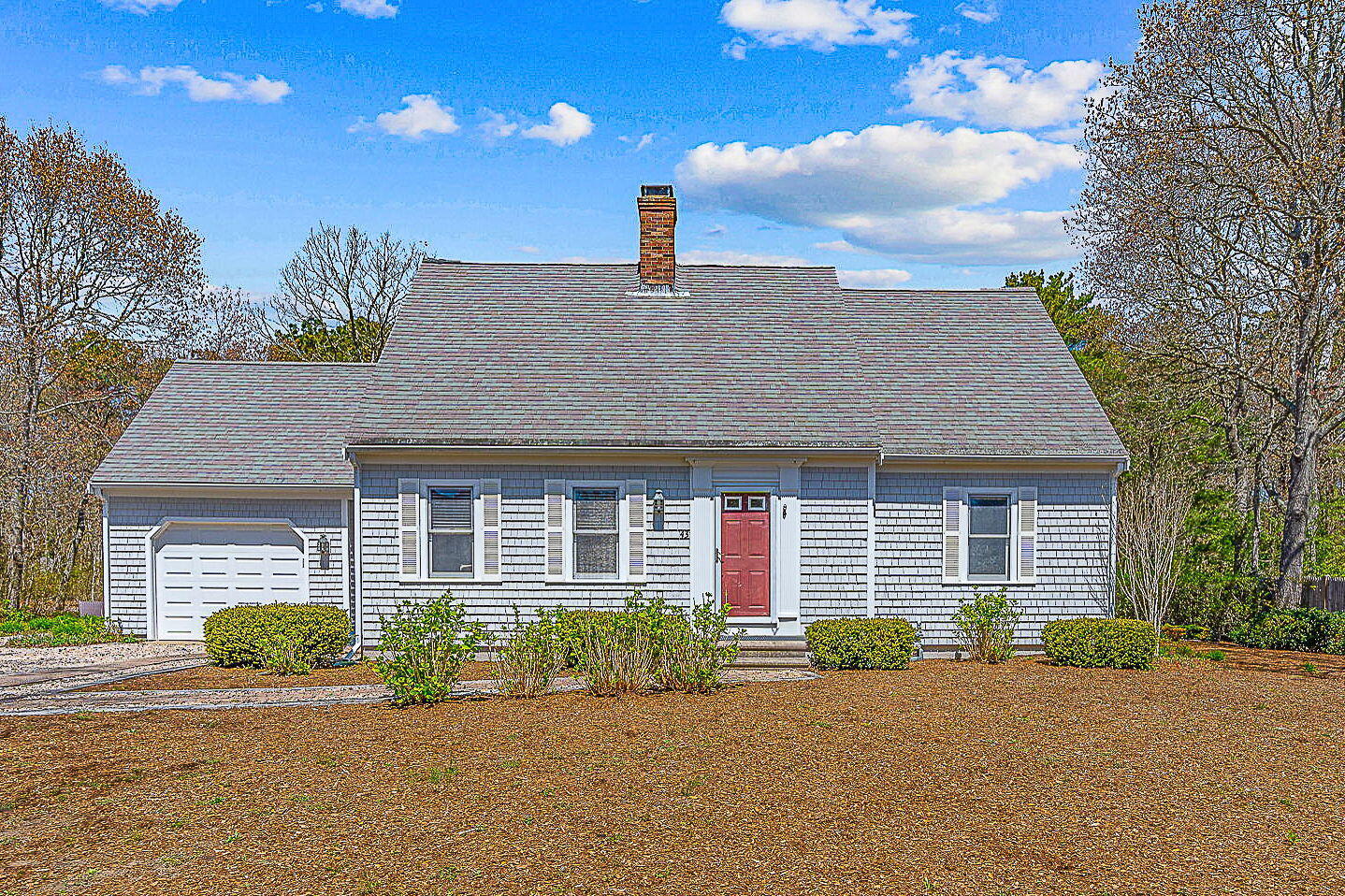 43 Neshobe Road Mashpee, MA 02649 - Photo 2 of 48 front view of a house with a street