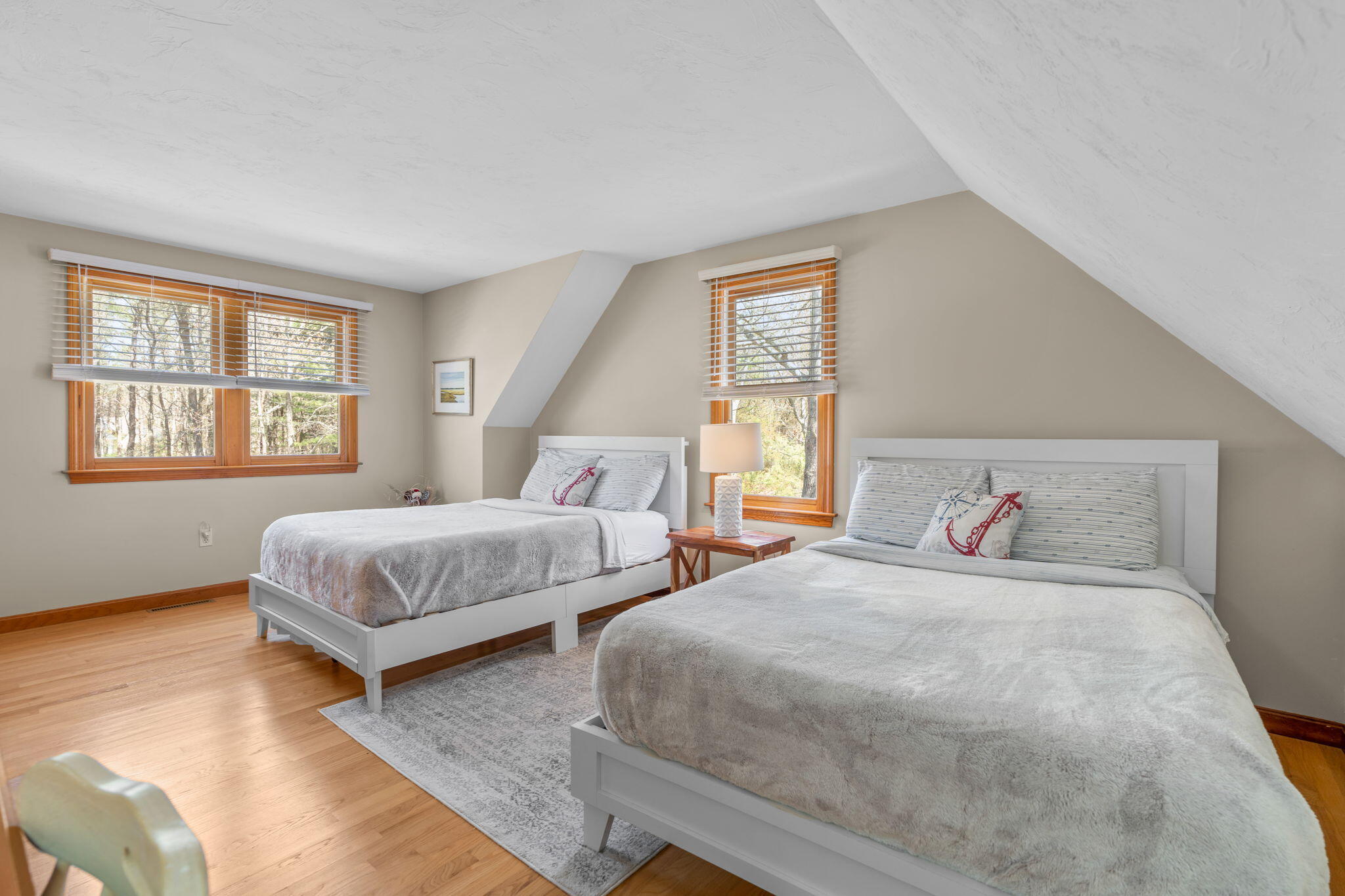 43 Neshobe Road Mashpee, MA 02649 - Photo 32 of 48 a bedroom with two beds and a window