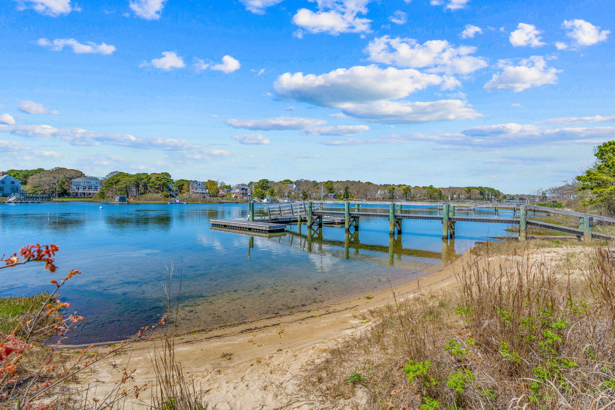 43 Neshobe Road Mashpee, MA 02649 - Photo 43 of 48 a view of a lake with houses