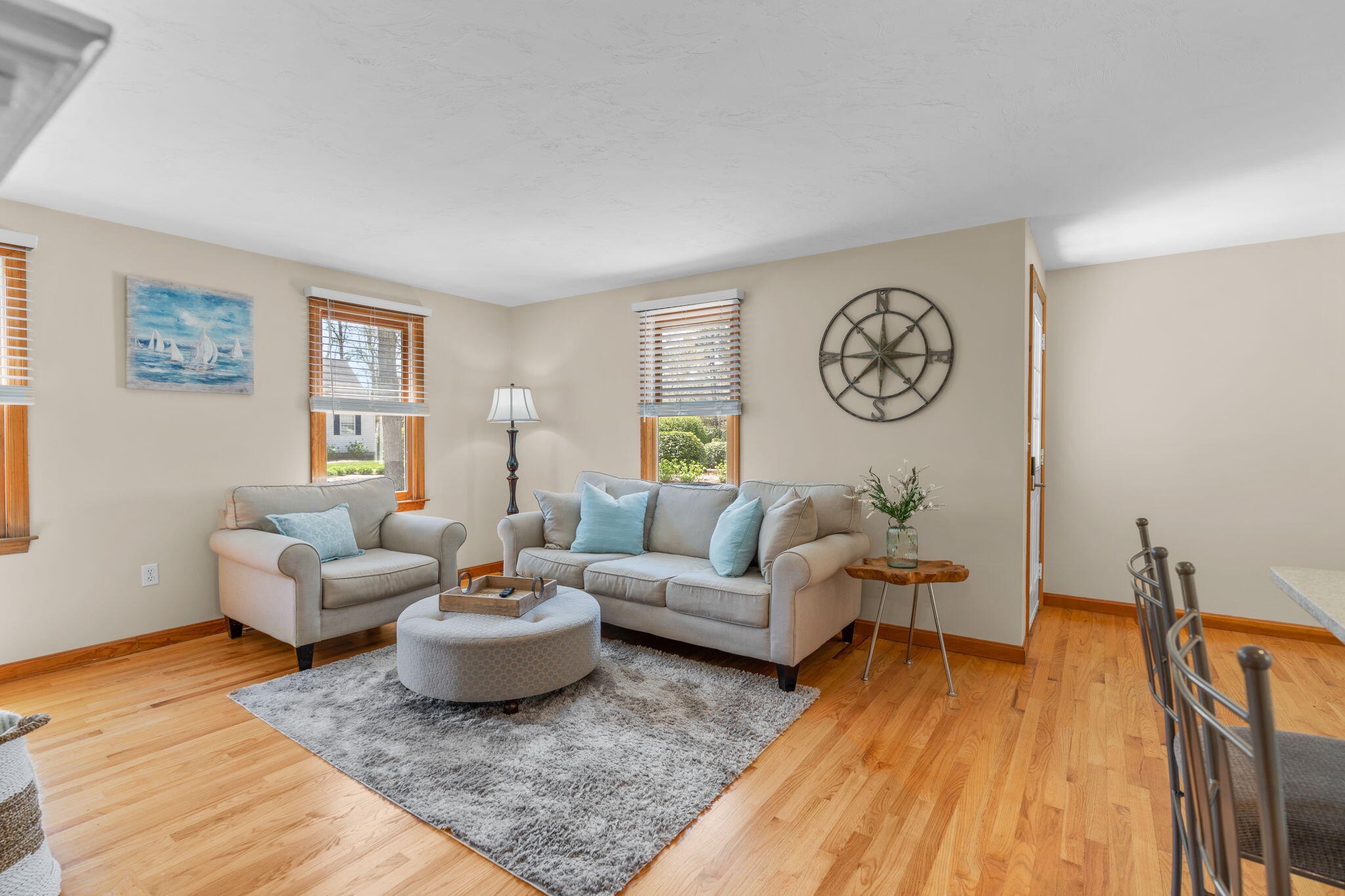 43 Neshobe Road Mashpee, MA 02649 - Photo 9 of 48 a living room with furniture and wooden floor