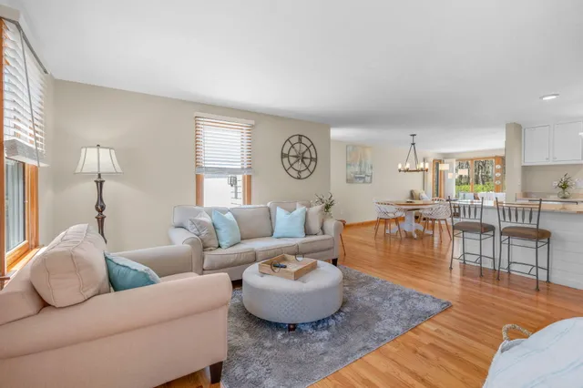 a living room with furniture and a table