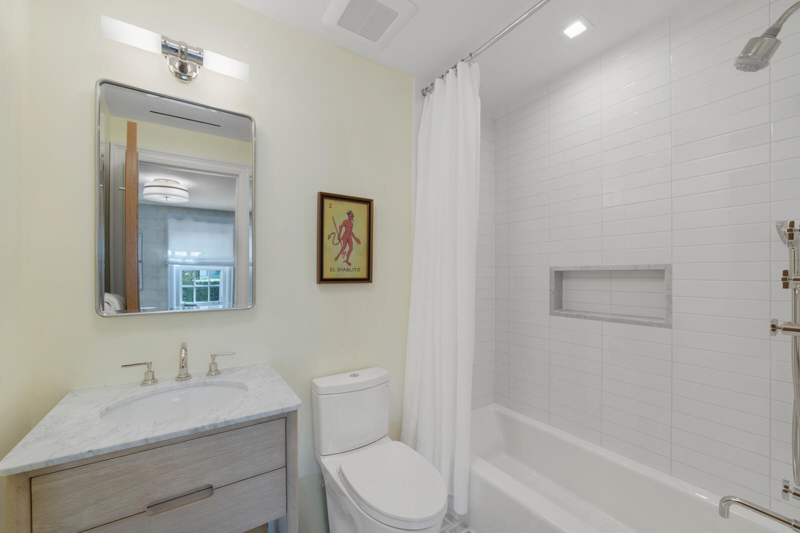 284 Monterey Road Palm Beach, FL 33480 - Photo 17 of 21 a bathroom with a toilet sink vanity tub and mirror