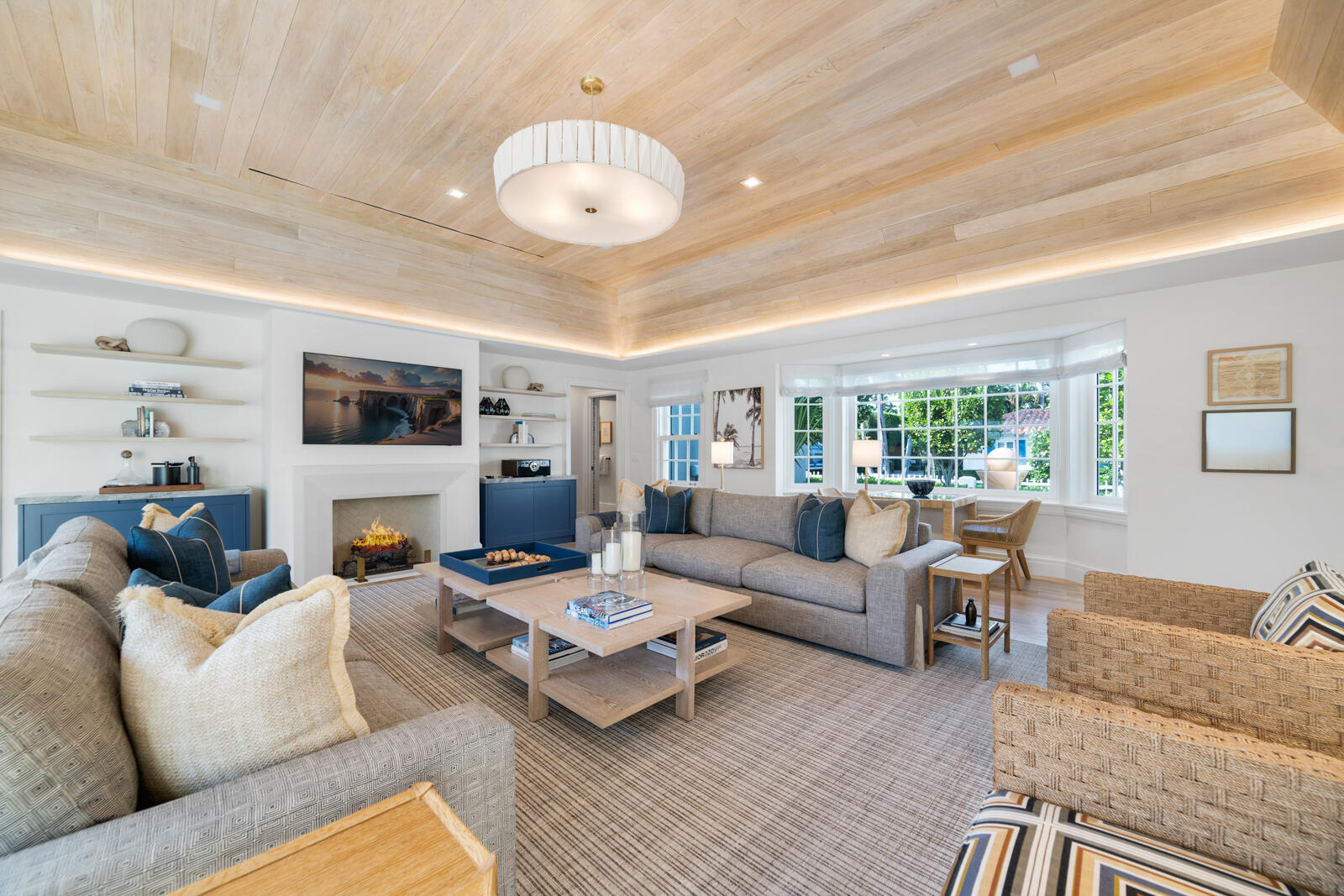 284 Monterey Road Palm Beach, FL 33480 - Photo 3 of 21 a living room with furniture kitchen and a chandelier