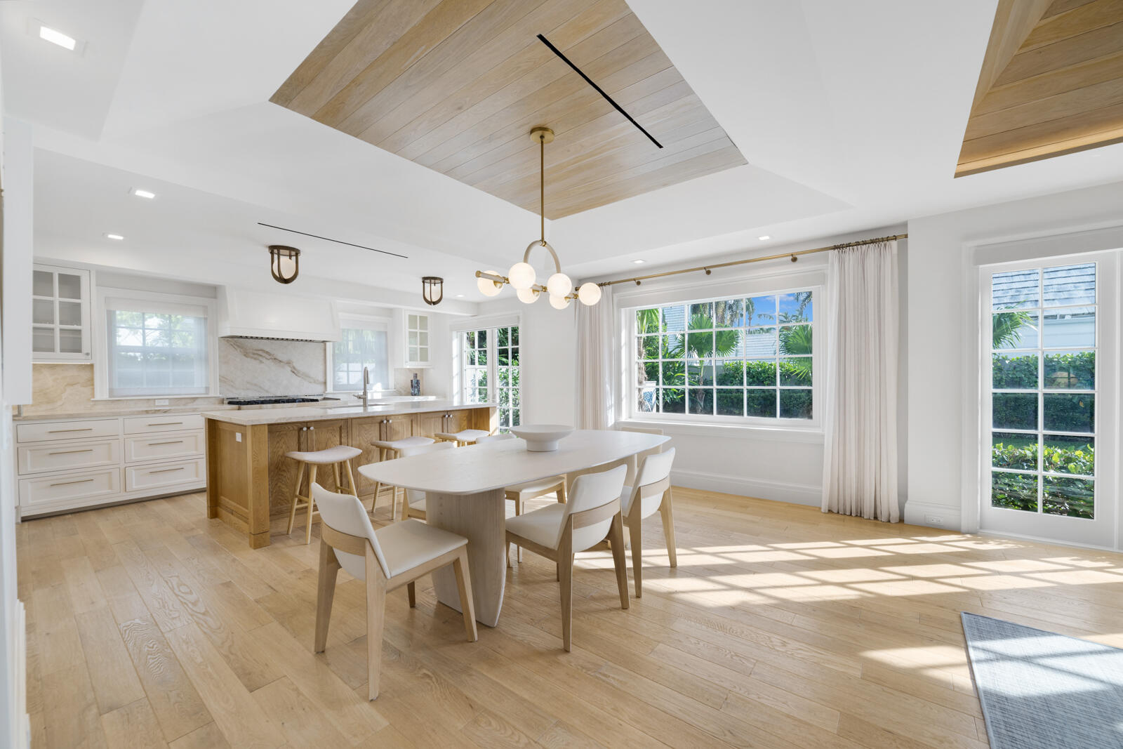 284 Monterey Road Palm Beach, FL 33480 - Photo 5 of 21 a view of a dining room with furniture window and wooden floor