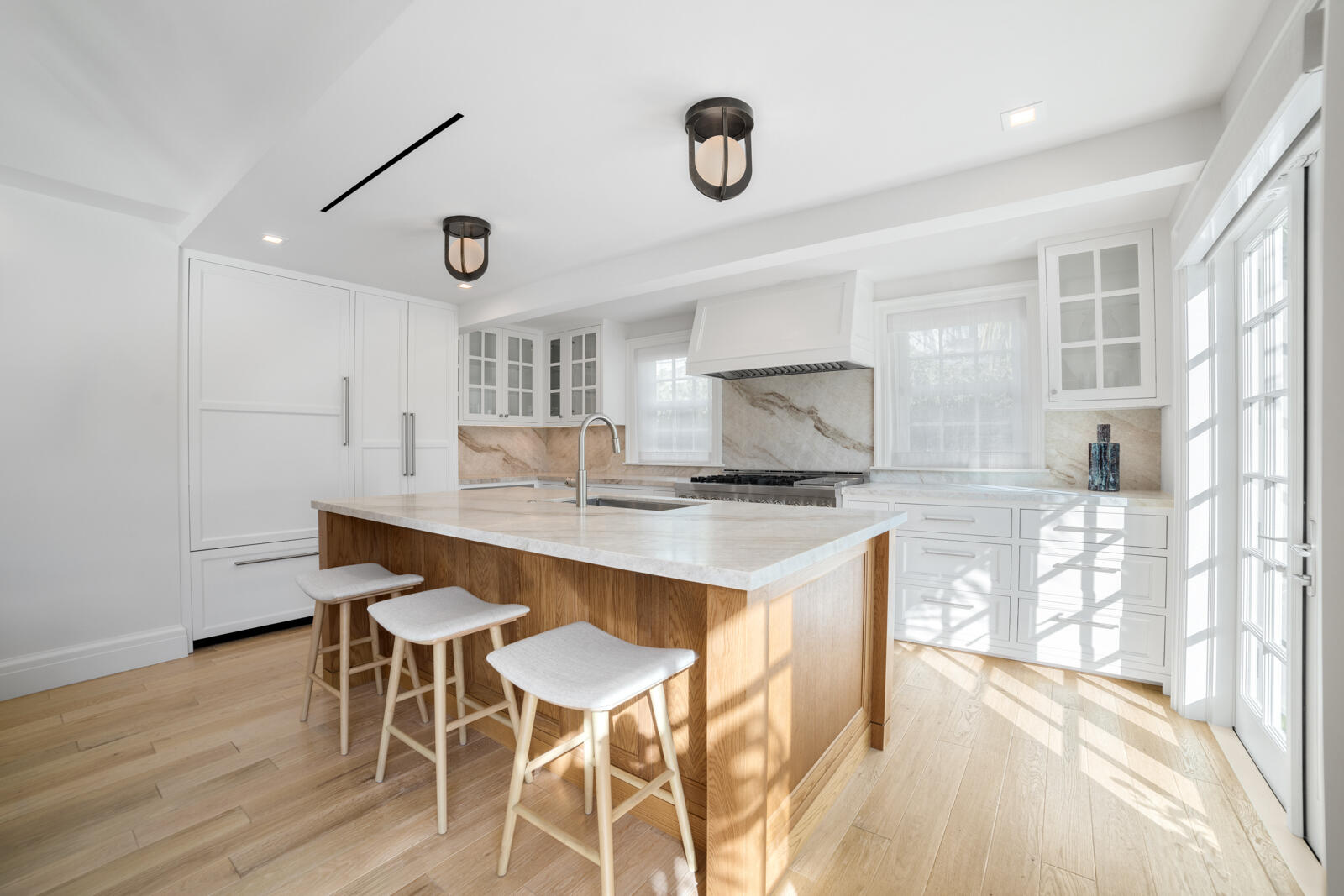 284 Monterey Road Palm Beach, FL 33480 - Photo 7 of 21 a kitchen with a table and chairs in it